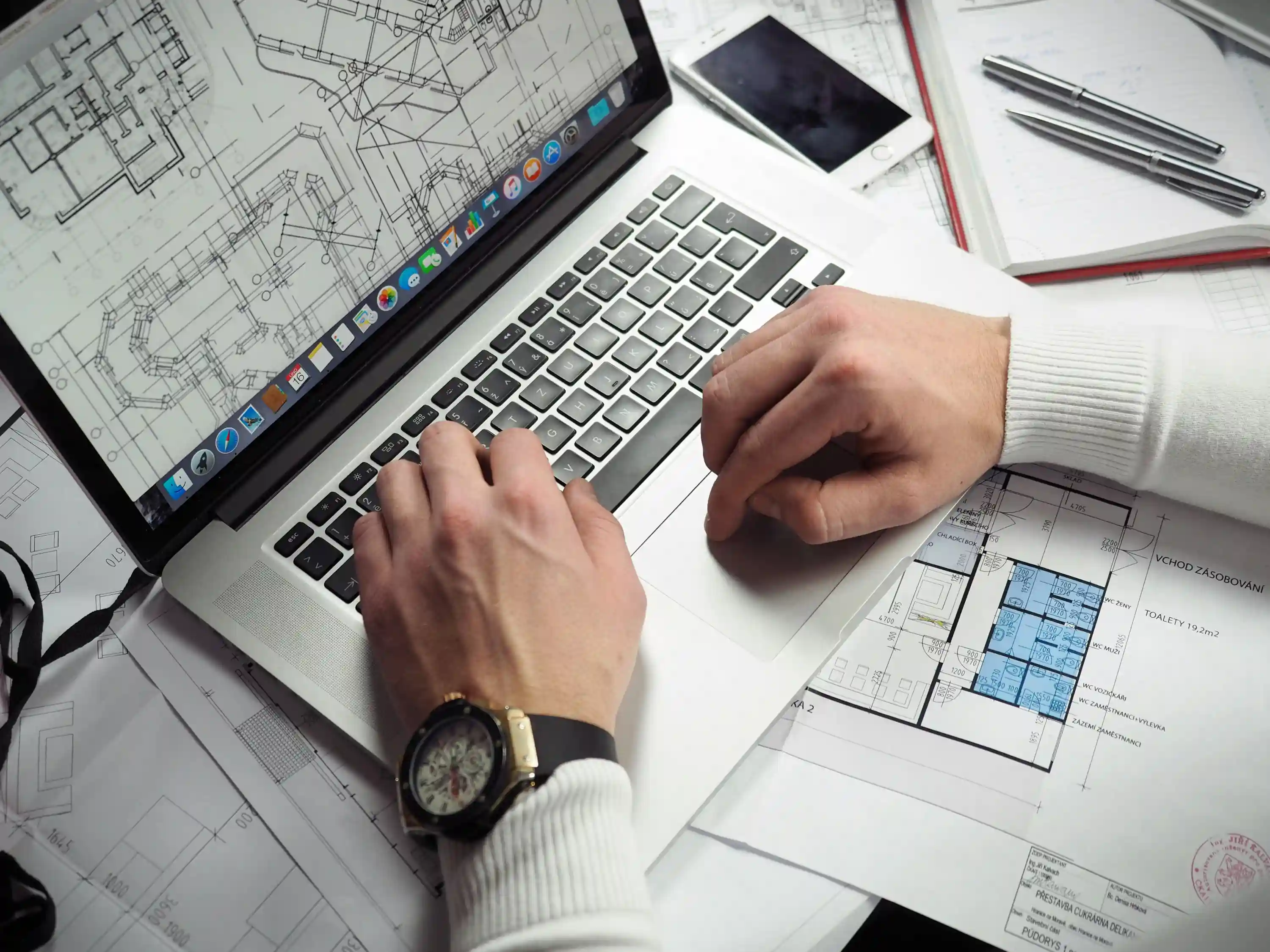 Builder using technology on a construction site for Part L compliance